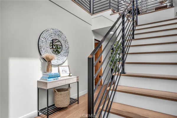 a view of entryway with wooden floor