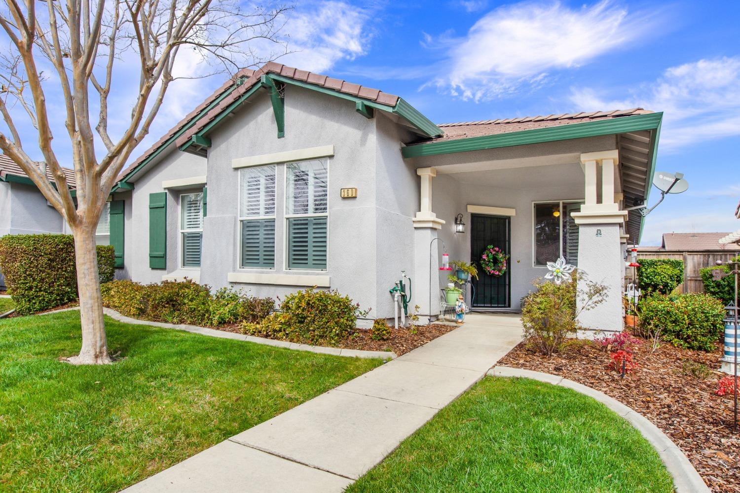 360 Mill Valley Circle North Sacramento, CA 95835 - Photo 1 of 51 a front view of a house with a yard