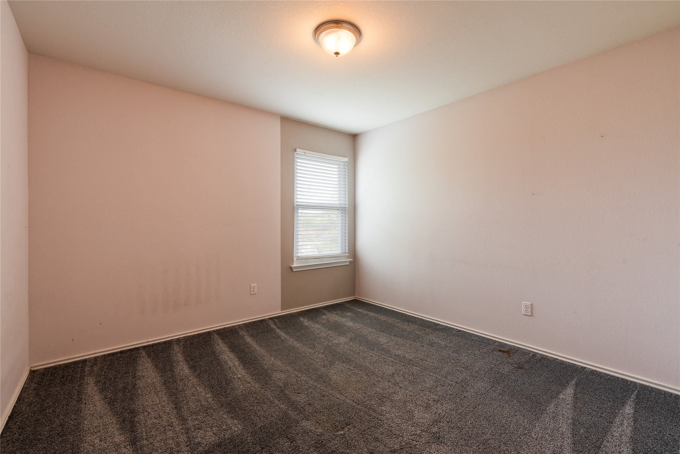 1329 Amberwood Loop Kyle, TX 78640 - Photo 18 of 27 an empty room with a empty space and a window