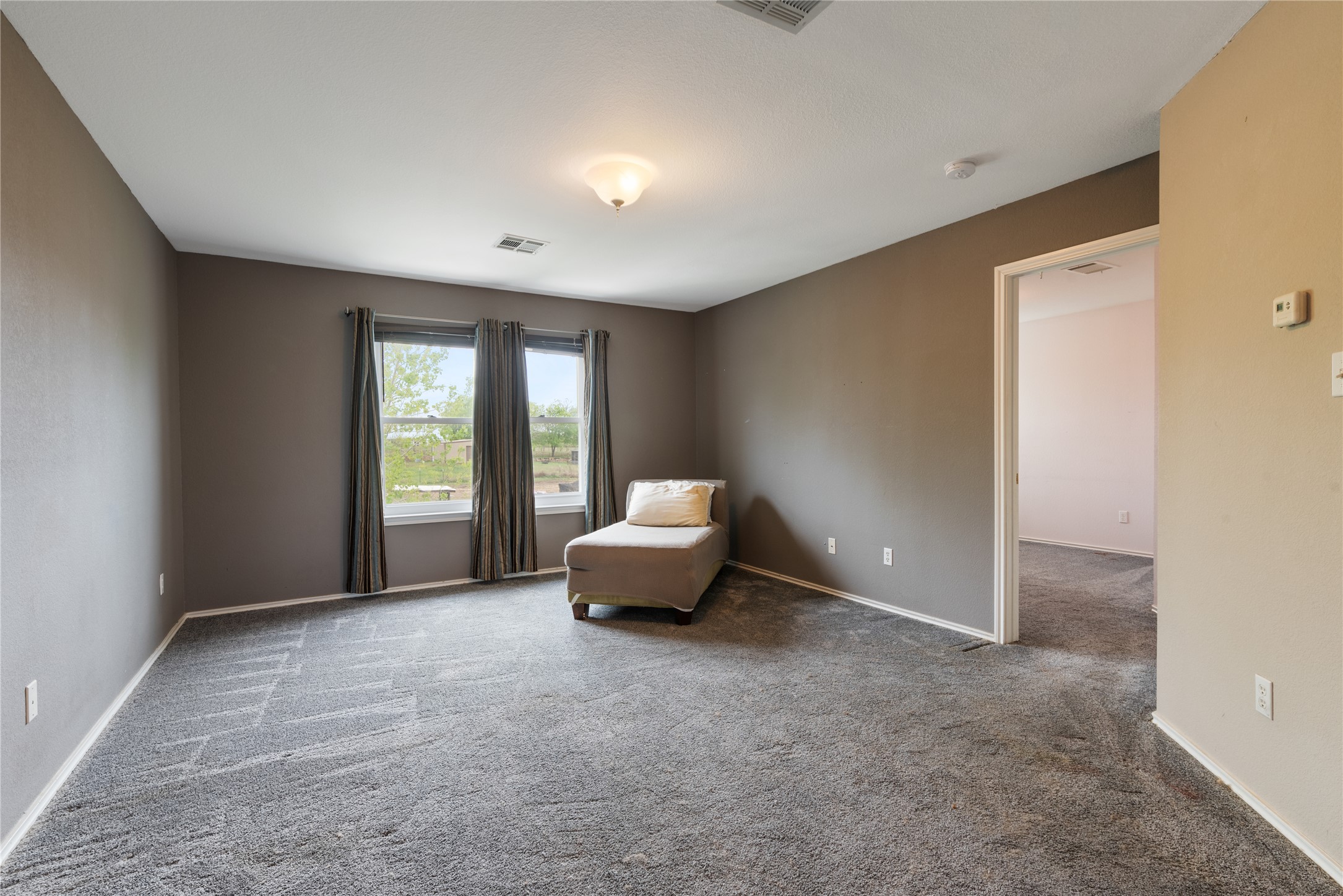 1329 Amberwood Loop Kyle, TX 78640 - Photo 8 of 27 a living room with furniture and a window