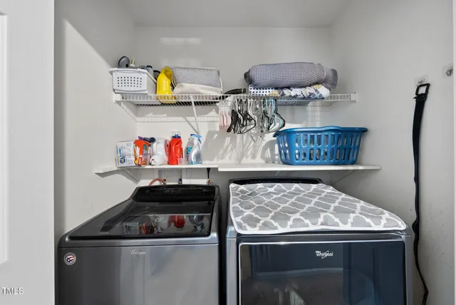 a kitchen with stainless steel appliances granite countertop a stove and a refrigerator