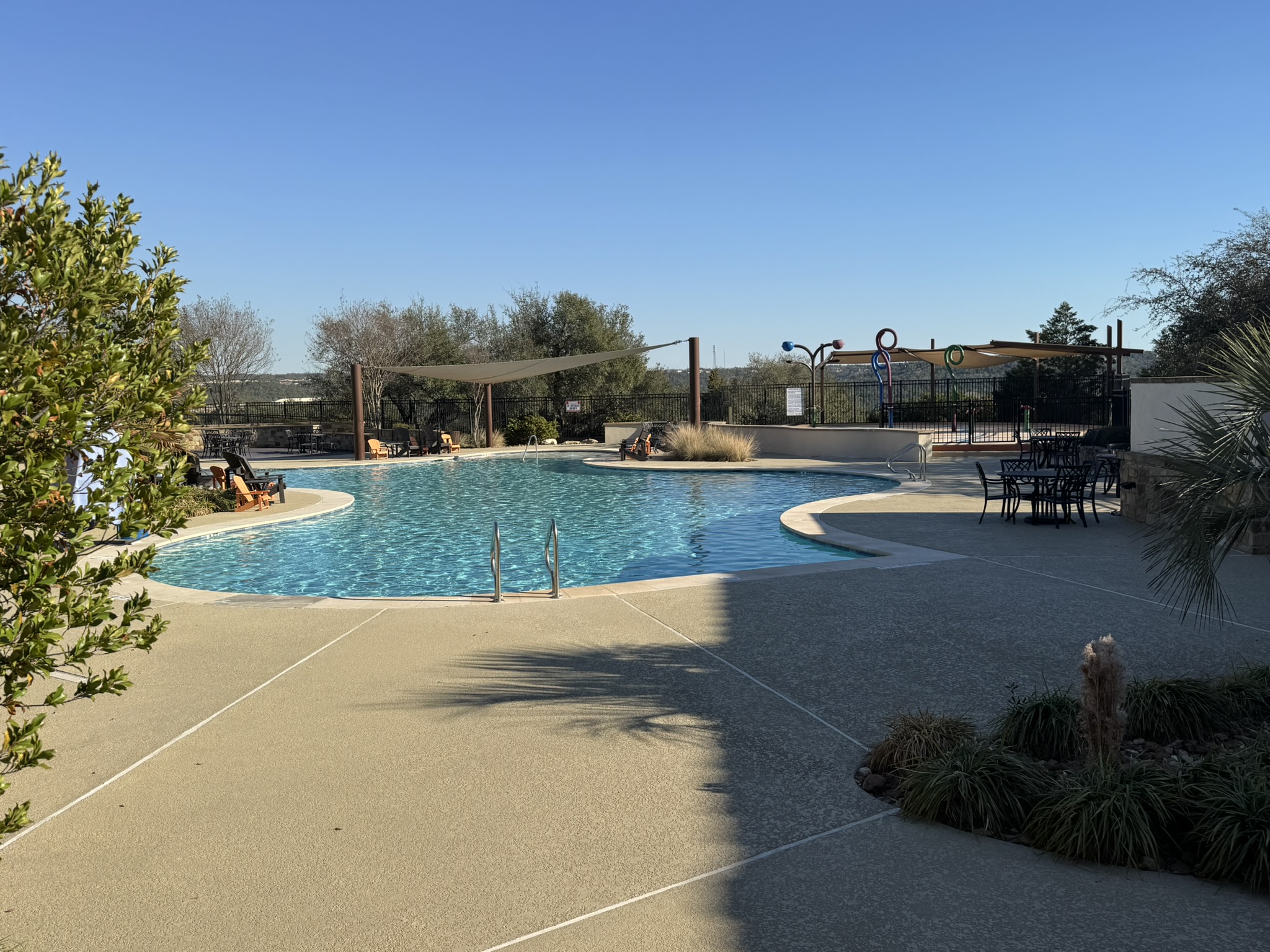 4500 Modena Bend Leander, TX 78641 - Photo 18 of 22 Community pool with a patio area