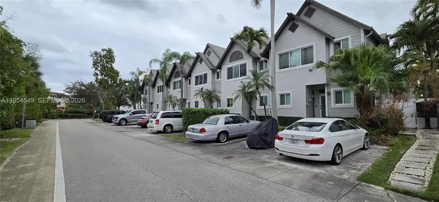 a car parked in front of a house