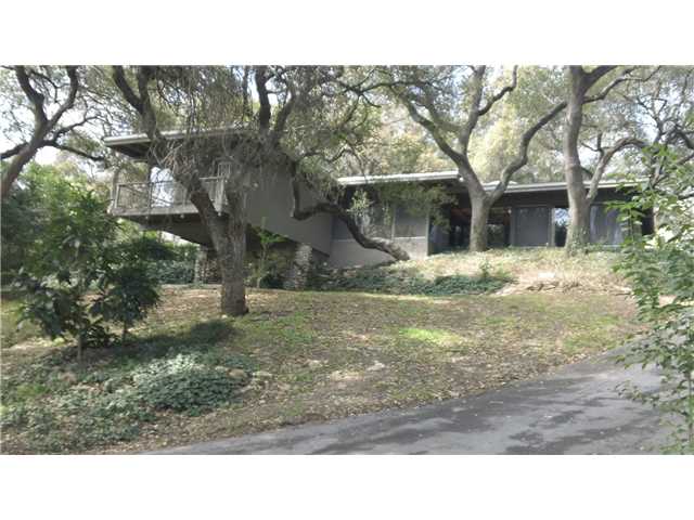 a black and white photo of a house