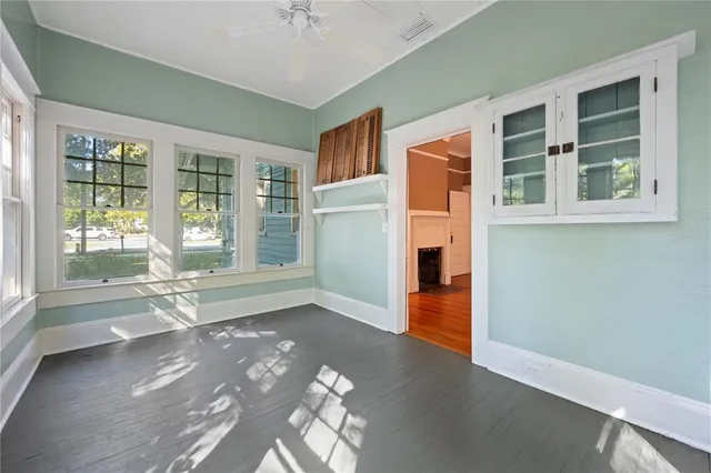a bathroom with a granite countertop sink a toilet and a bathtub