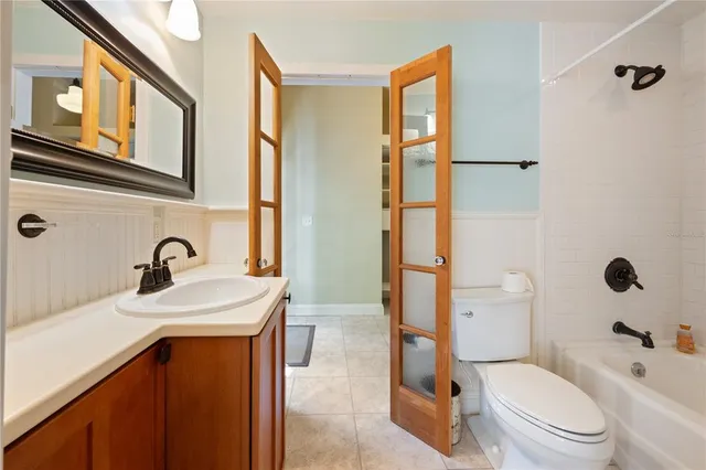 a view of a hallway with washer and dryer