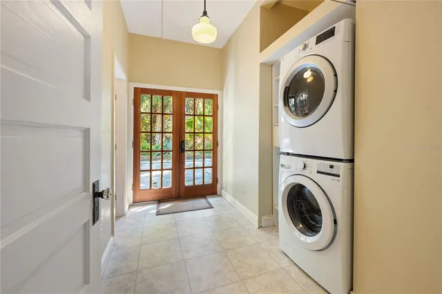 a bedroom with a bed and cabinets