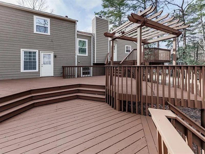 1400 Boxwood Trace Northwest Acworth, GA 30102 - Photo 4 of 23 a view of a house with a wooden deck