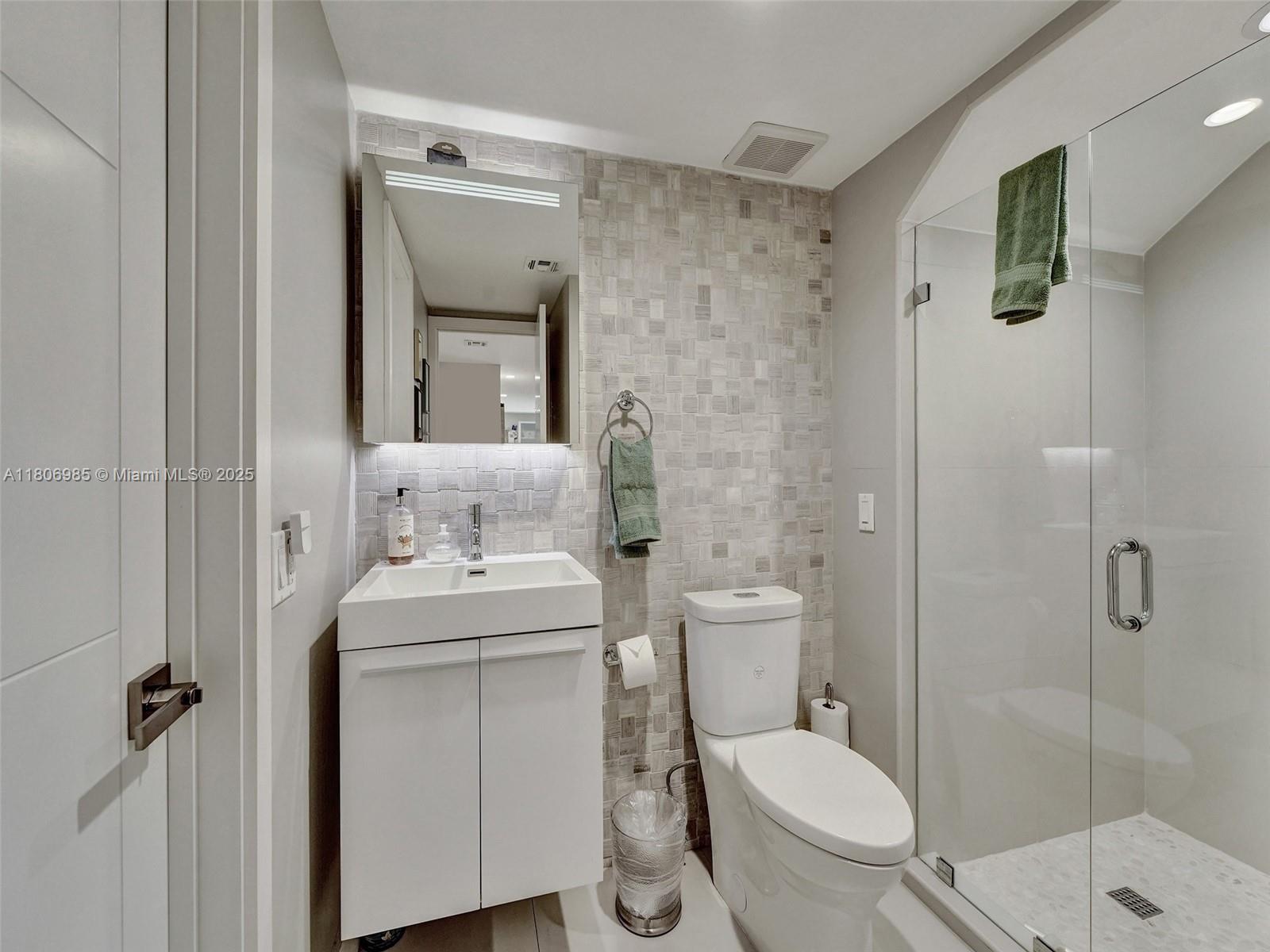 3638 Southwest 57th Avenue Miami, FL 33155 - Photo 13 of 43 a bathroom with a sink toilet and shower