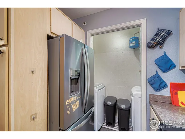 a bathroom with a shower and a mirror