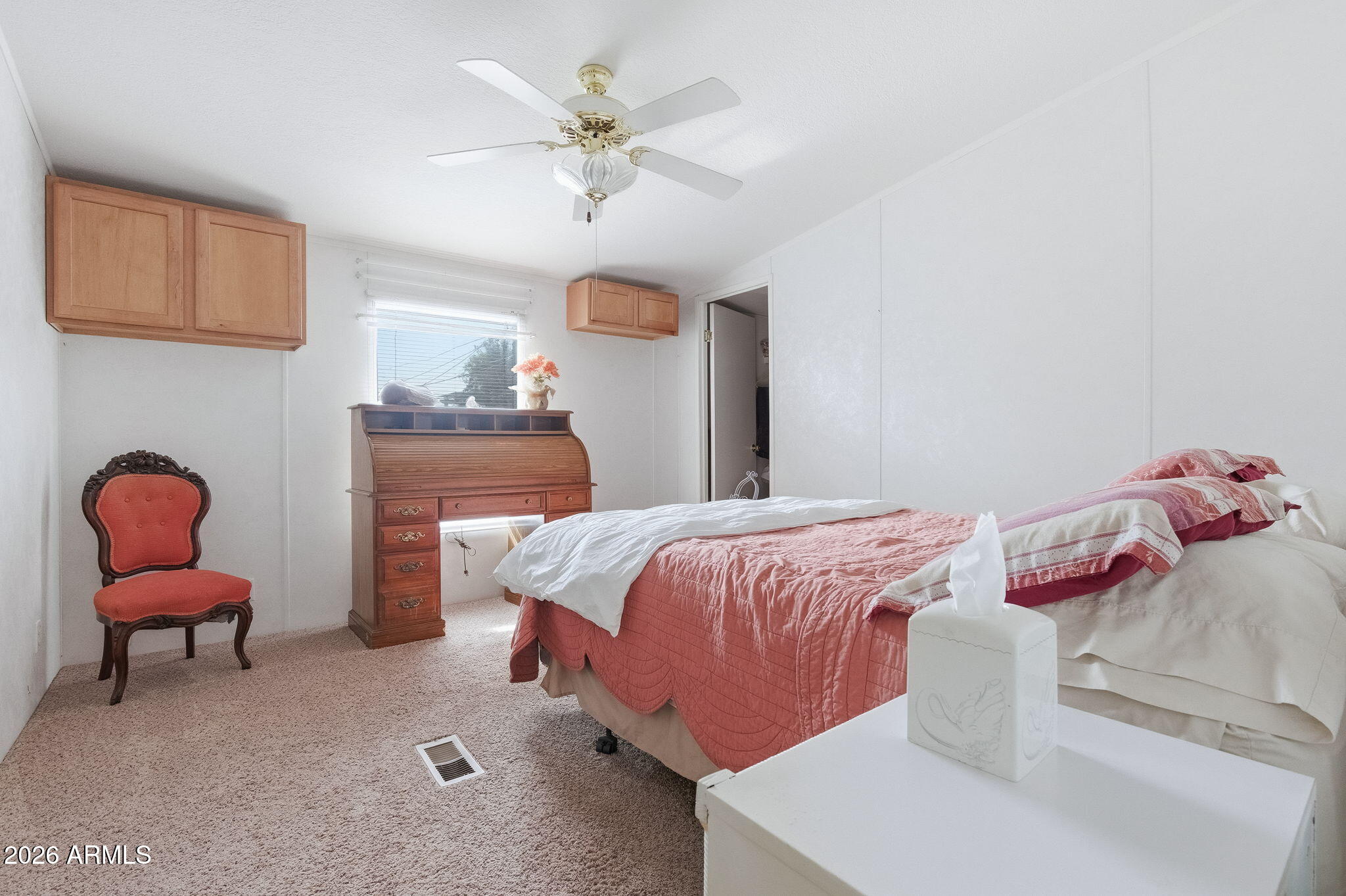 13202 North 19th Way Phoenix, AZ 85022 - Photo 15 of 20 a bedroom with a bed and a chandelier