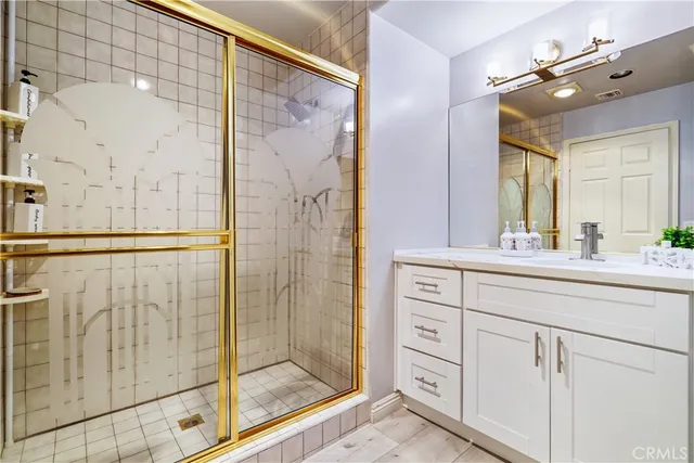 a living room with fireplace furniture and a wooden floor