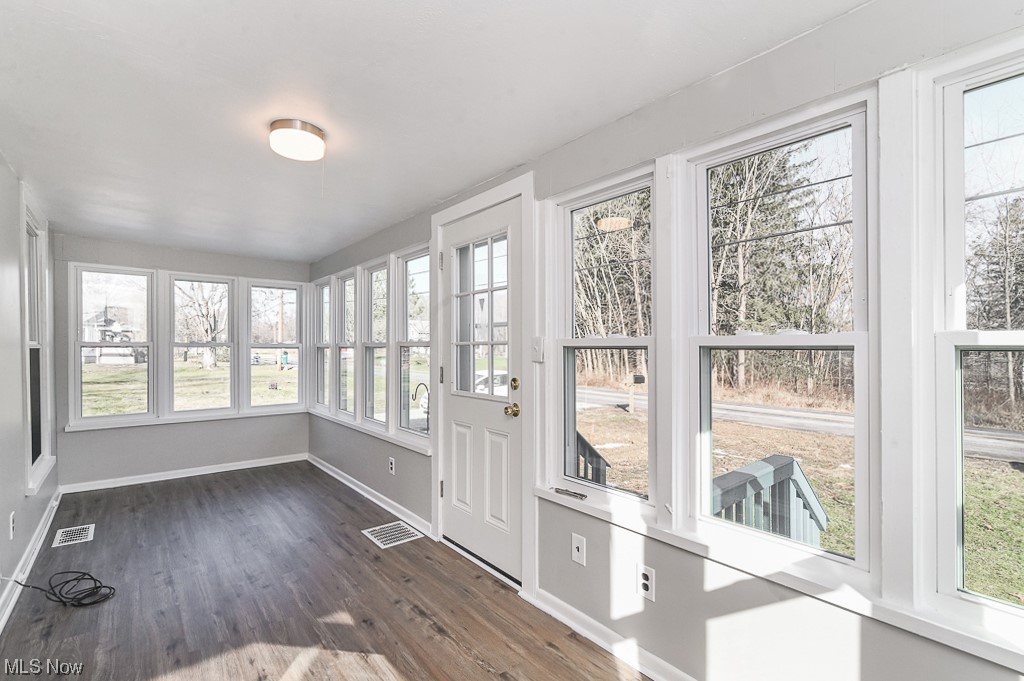 6469 Red Brush Road Ravenna, OH 44266 - Photo 5 of 34 Unfurnished sunroom featuring a wealth of natural light