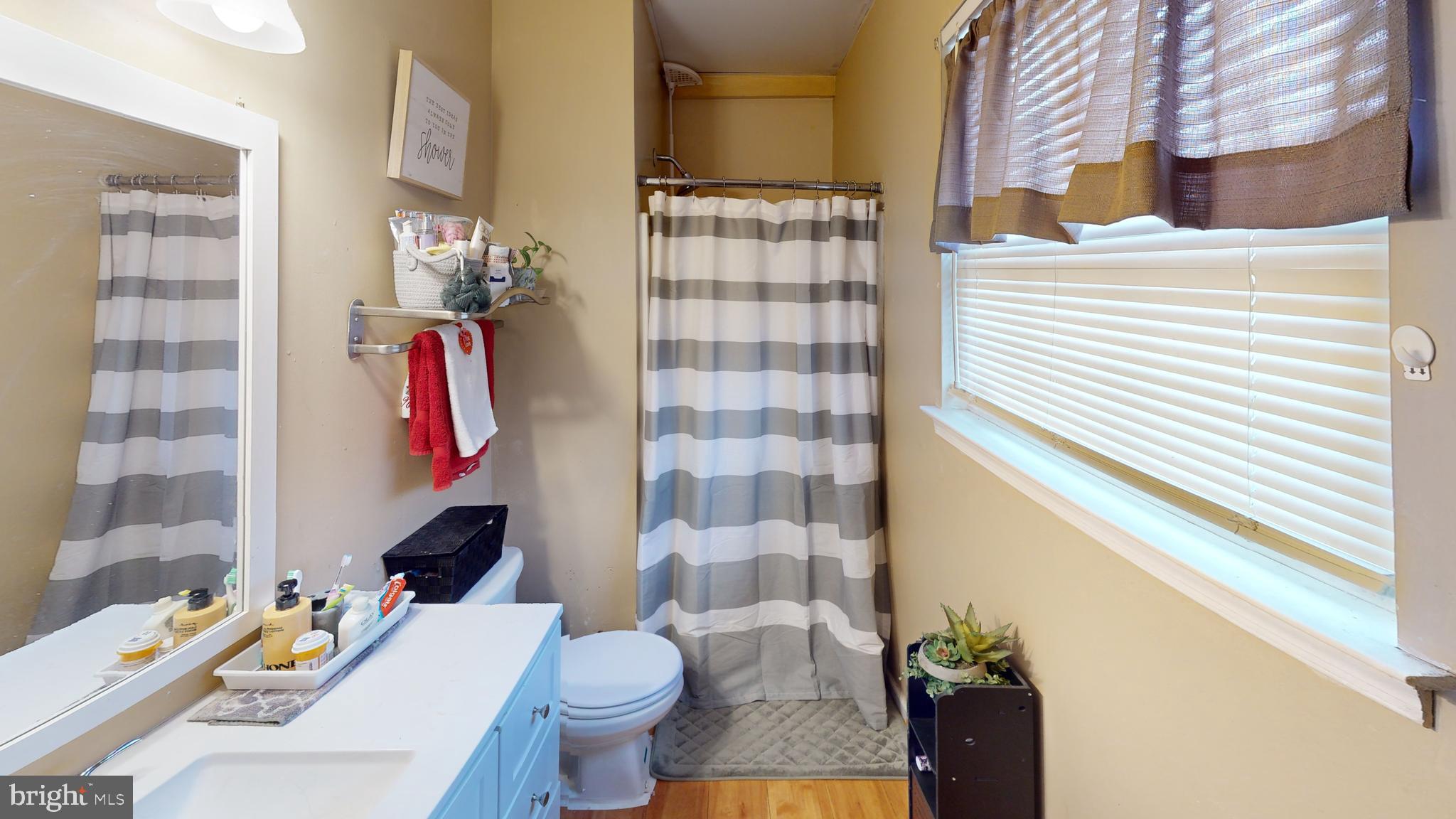1121 Robin Terrace Millville, NJ 08332 - Photo 16 of 29 a bathroom with a sink toilet and shower
