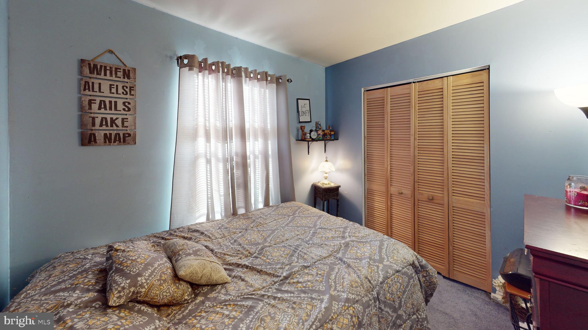 1121 Robin Terrace Millville, NJ 08332 - Photo 17 of 29 a bedroom with a bed and a window