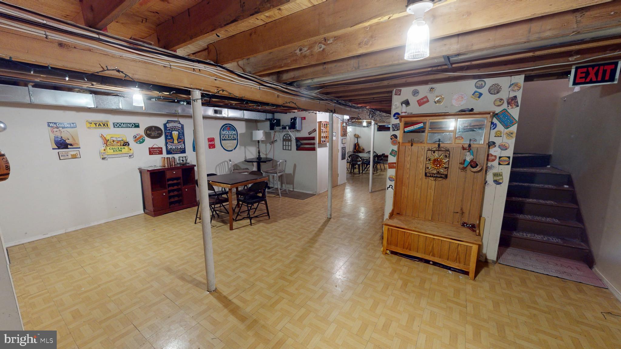 1121 Robin Terrace Millville, NJ 08332 - Photo 21 of 29 a view of a storage room with racks on the wall
