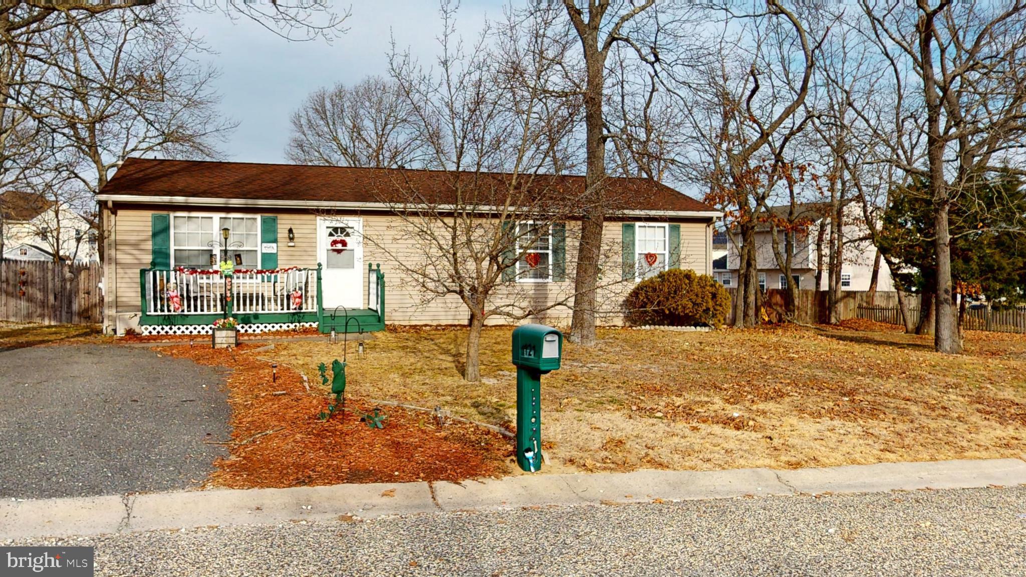 1121 Robin Terrace Millville, NJ 08332 - Photo 3 of 29 a front view of a house with garden