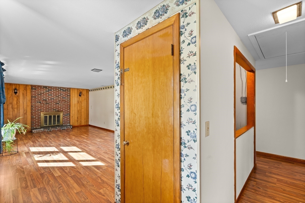 26 Brook Street Easthampton, MA 01027 - Photo 17 of 27 a view of a hallway with windows