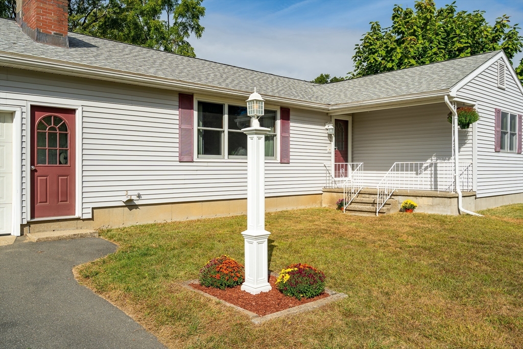 26 Brook Street Easthampton, MA 01027 - Photo 2 of 27 a view of a house with swimming pool