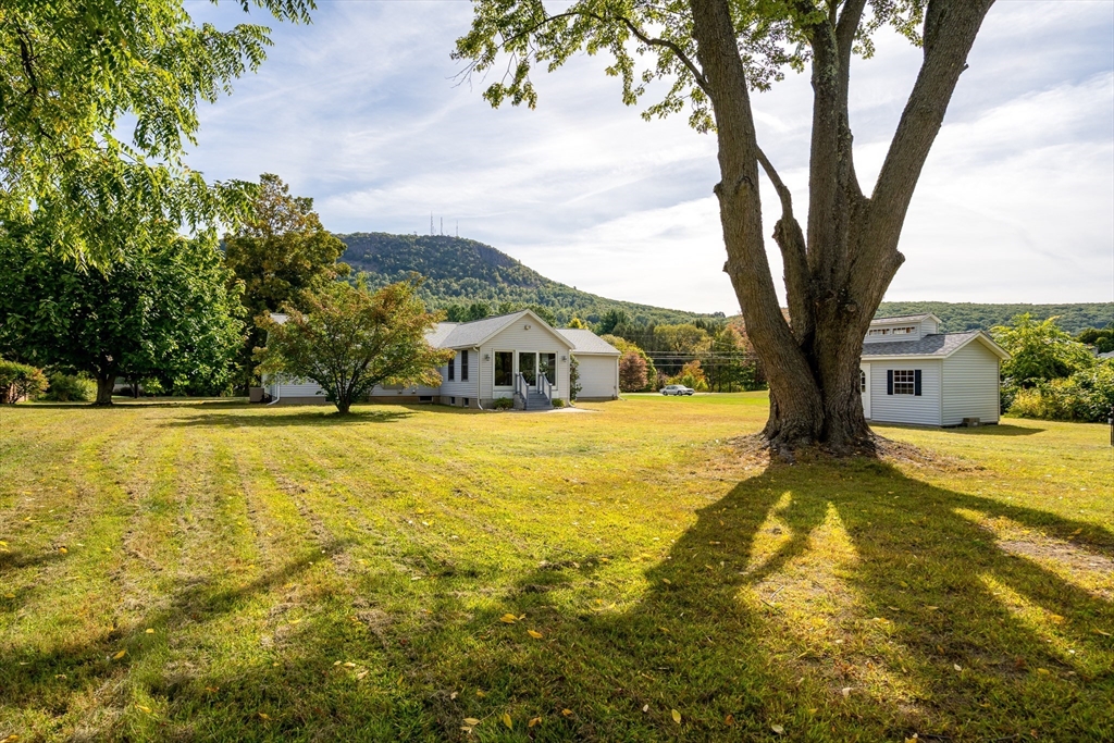 26 Brook Street Easthampton, MA 01027 - Photo 4 of 27 a view of swimming pool with an outdoor space
