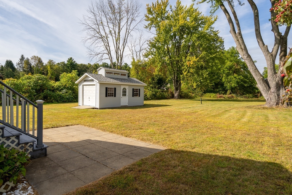 26 Brook Street Easthampton, MA 01027 - Photo 6 of 27 a view of house with outdoor space and trees in the background