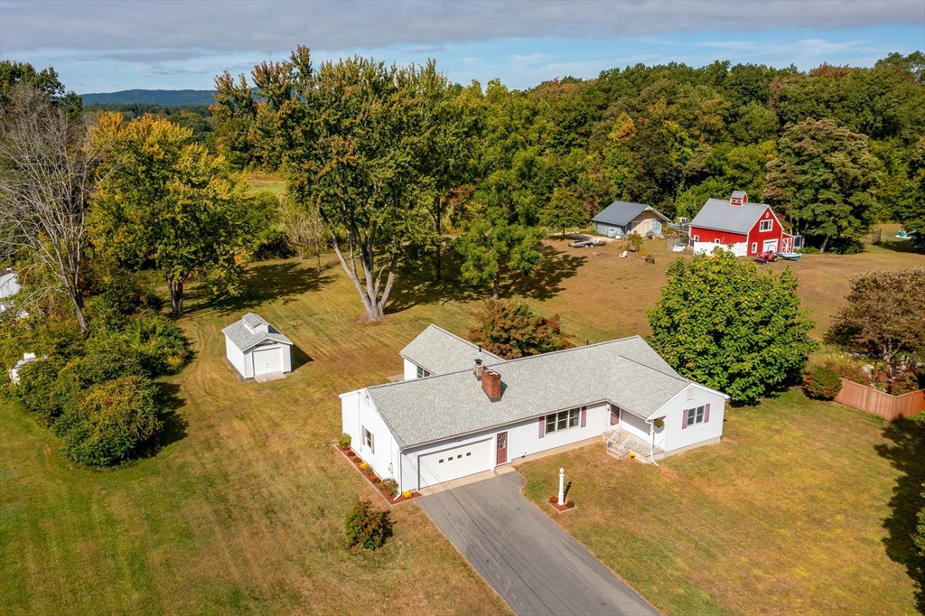26 Brook Street Easthampton, MA 01027 - Photo 7 of 27 an aerial view of a house with a yard
