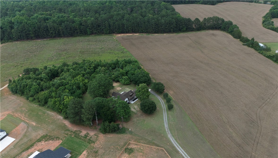 2817 Broadway Lake Road Anderson, SC 29621 - Photo 35 of 41 A private home nestled amidst verdant woodlands and agricultural fields, offering serene rural living.