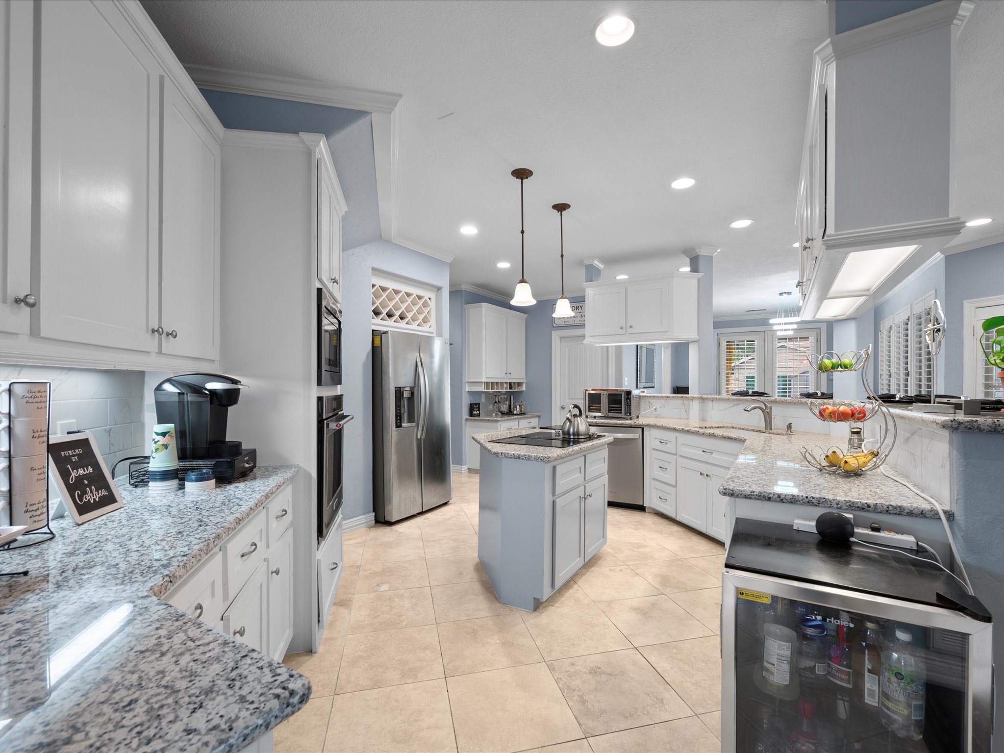 16123 Lafone Drive Spring, TX 77379 - Photo 15 of 47 With expansive countertops, abundant cabinetry, and under-cabinet lighting, this impressive kitchen offers the space to prepare holiday meals, gather with loved ones, and create lasting memories for years to come.