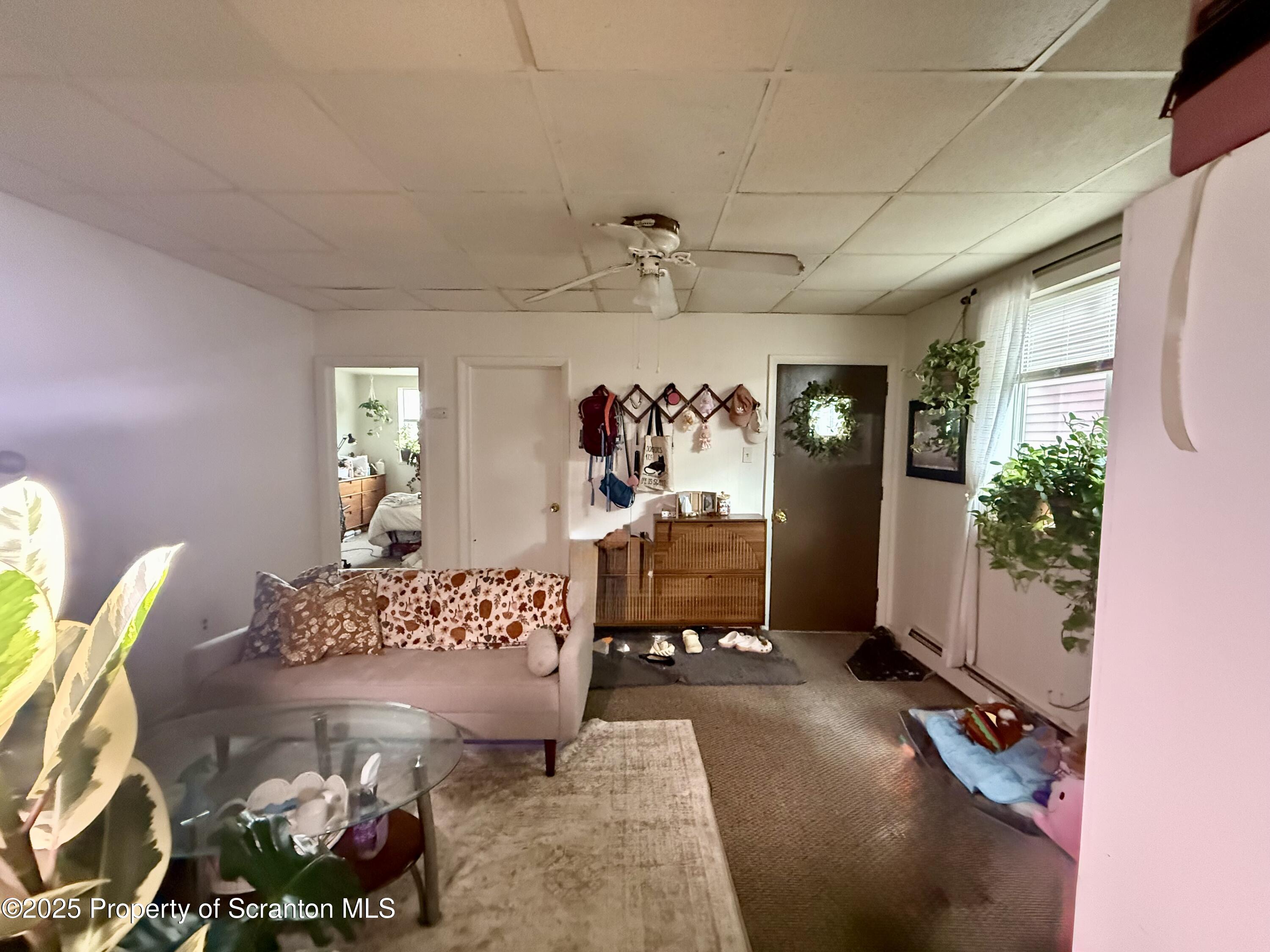 1121 Albright Avenue Scranton, PA 18508 - Photo 7 of 17 a view of a livingroom with furniture and window