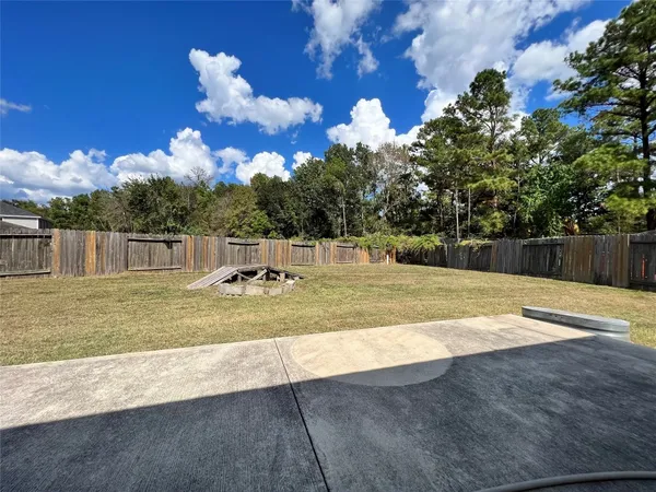 a view of a playground with basketball court