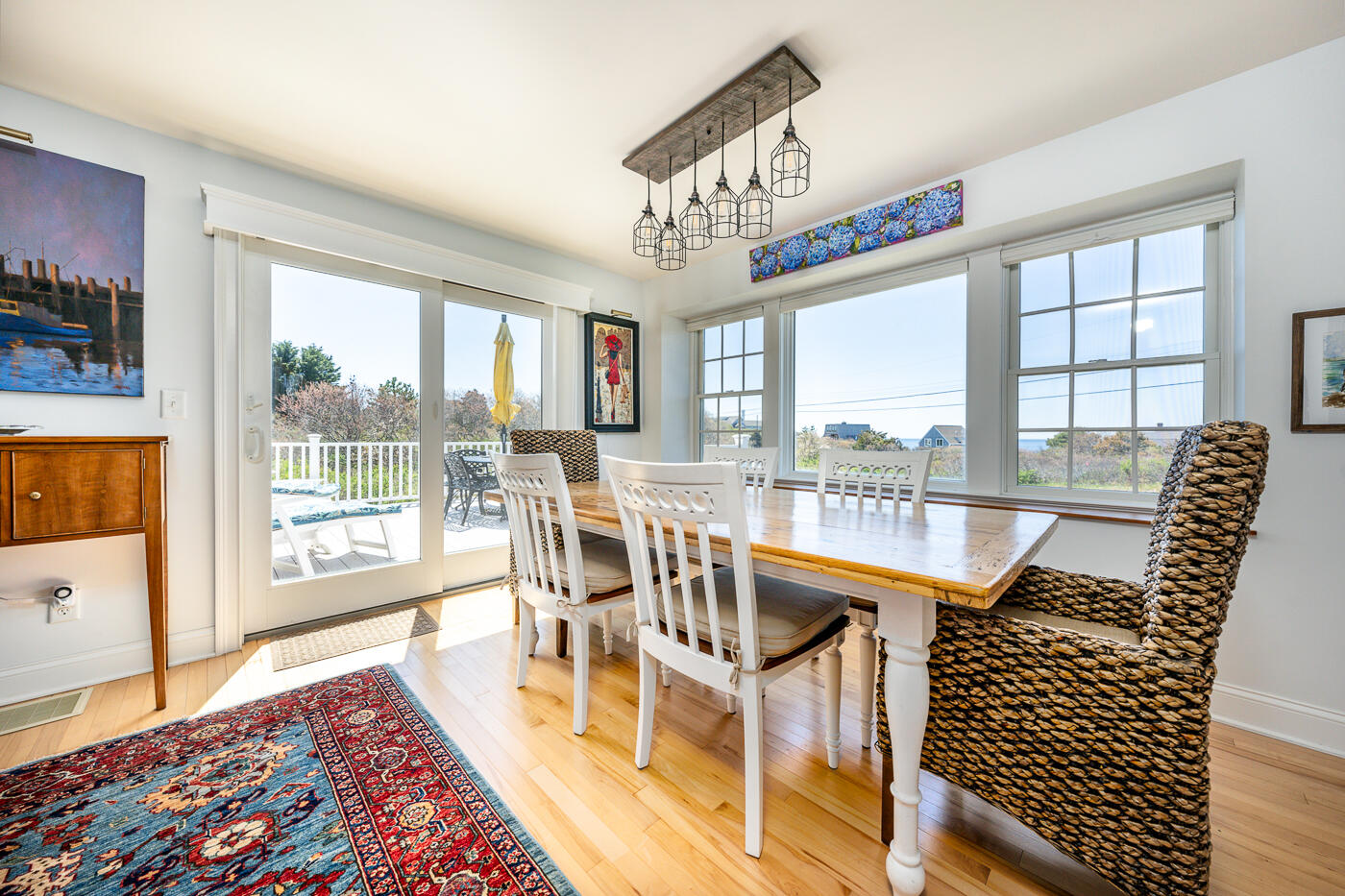 16 Bay View Road Truro, MA 02666 - Photo 18 of 57 a view of a dining room with furniture window and outside view