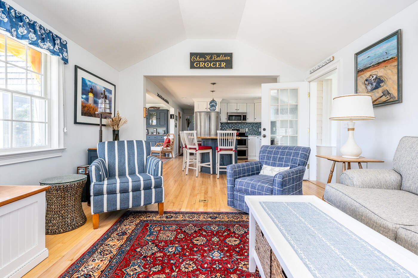 16 Bay View Road Truro, MA 02666 - Photo 22 of 57 a living room with furniture and a rug
