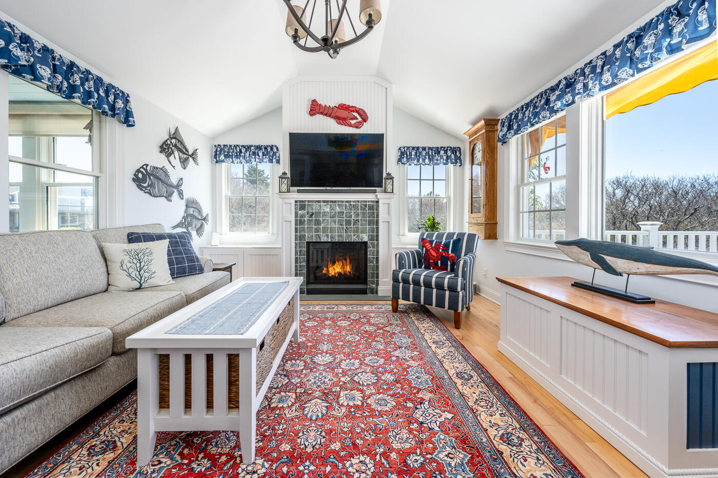 16 Bay View Road Truro, MA 02666 - Photo 23 of 57 a living room with furniture fireplace and flat screen tv