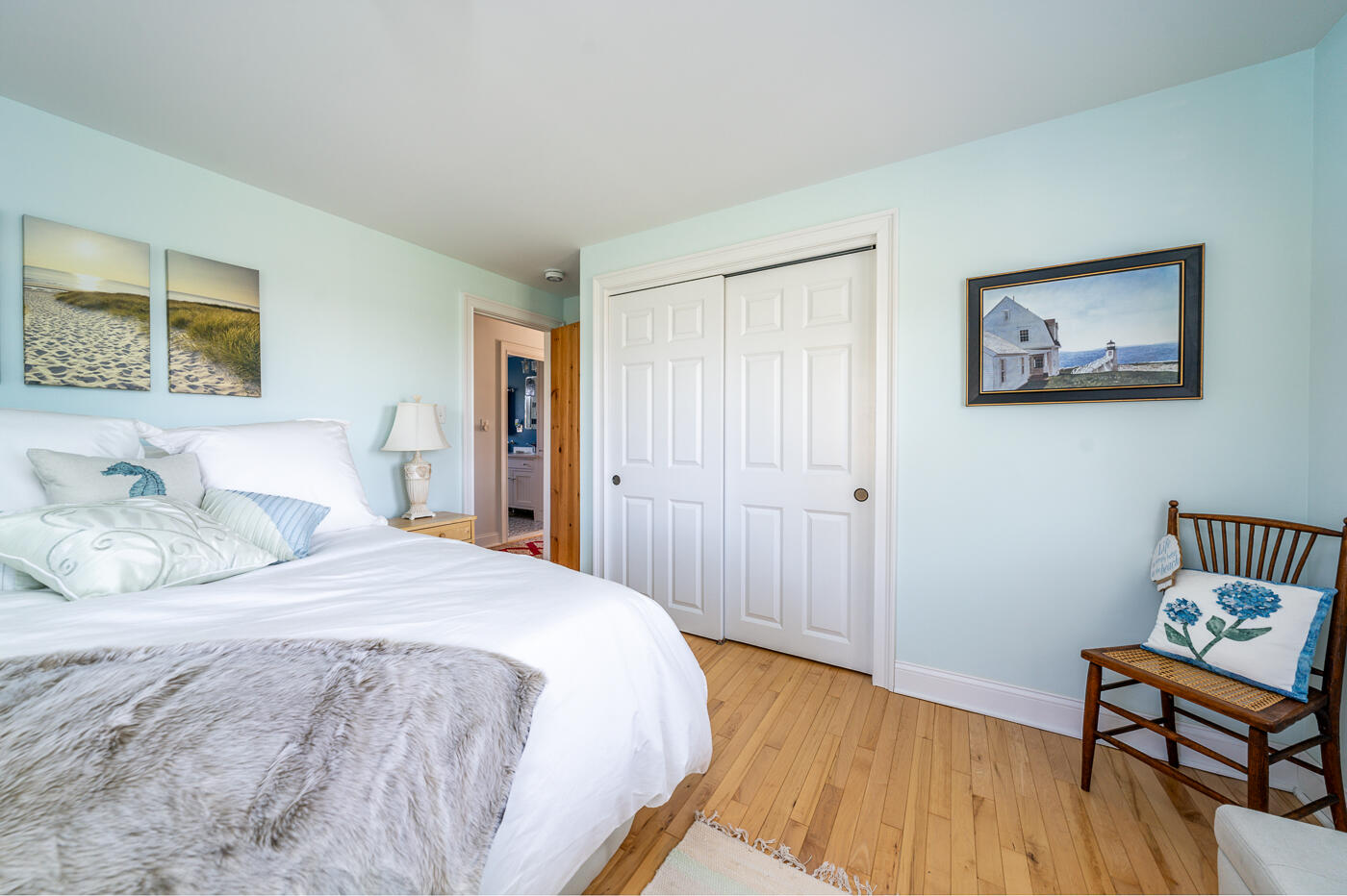 16 Bay View Road Truro, MA 02666 - Photo 29 of 57 a bedroom with a bed and a chair