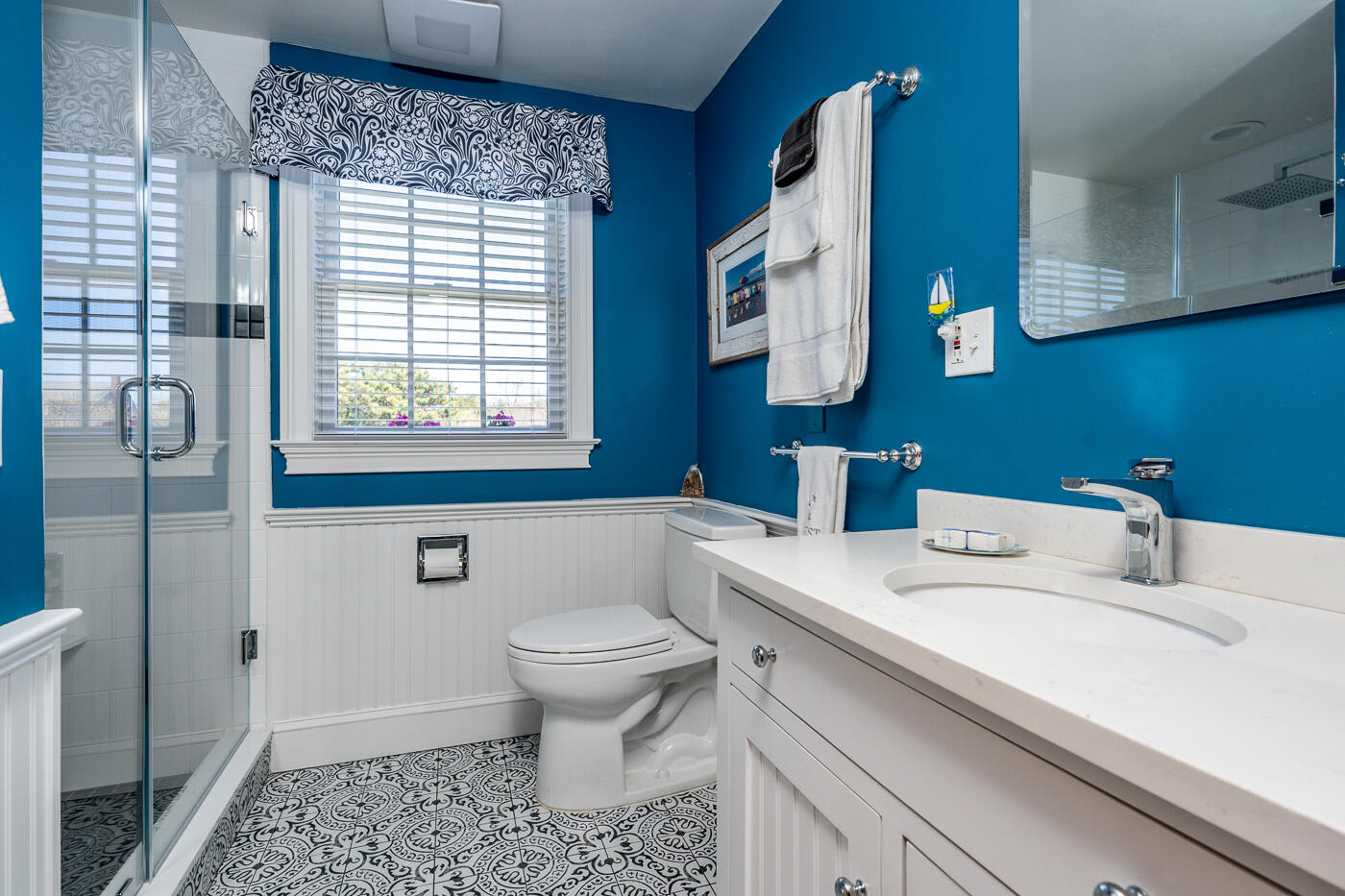16 Bay View Road Truro, MA 02666 - Photo 30 of 57 a bathroom with a sink a toilet and mirror