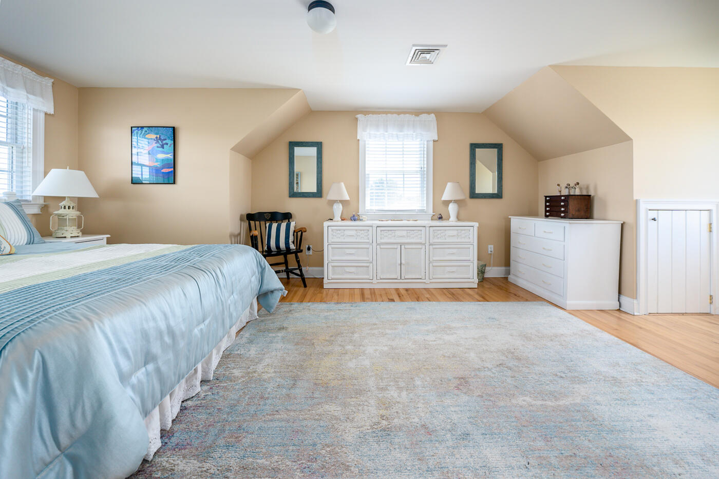 16 Bay View Road Truro, MA 02666 - Photo 34 of 57 a bed room with a bed and a couch