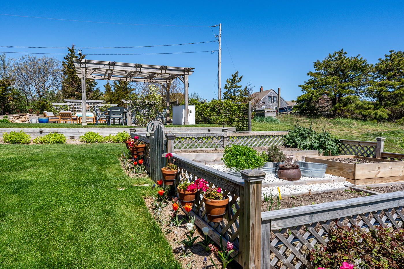 16 Bay View Road Truro, MA 02666 - Photo 46 of 57 a view of a fountain in the yard with a fountain