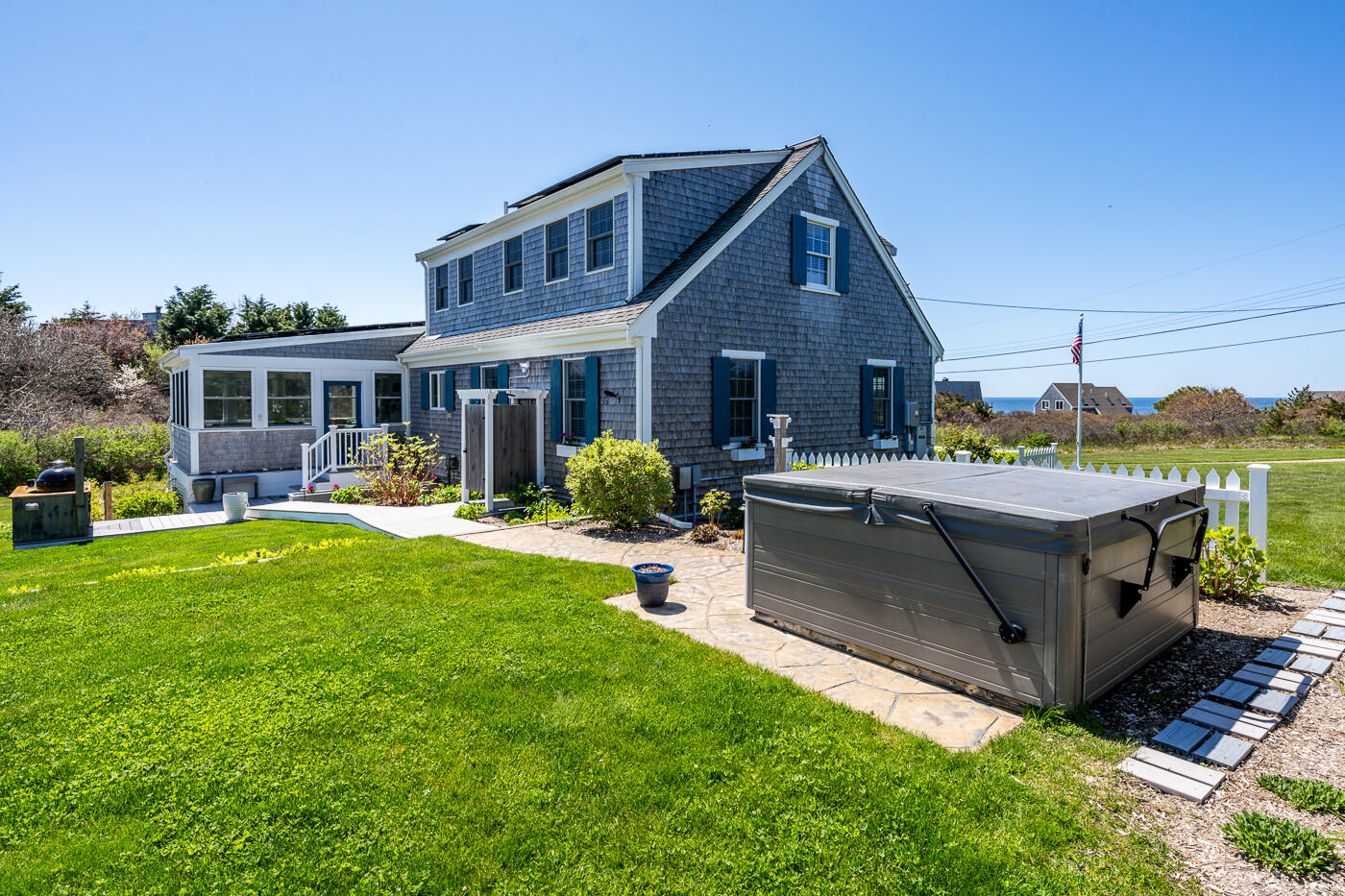 16 Bay View Road Truro, MA 02666 - Photo 5 of 57 a view of a house with a yard and sitting area