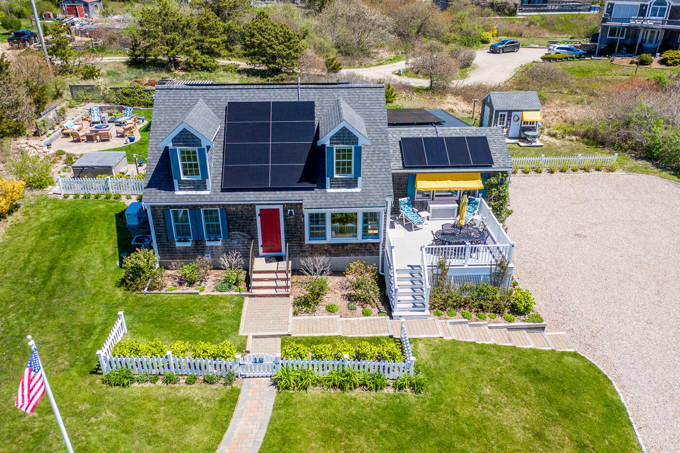 16 Bay View Road Truro, MA 02666 - Photo 52 of 57 a front view of a house with a garden