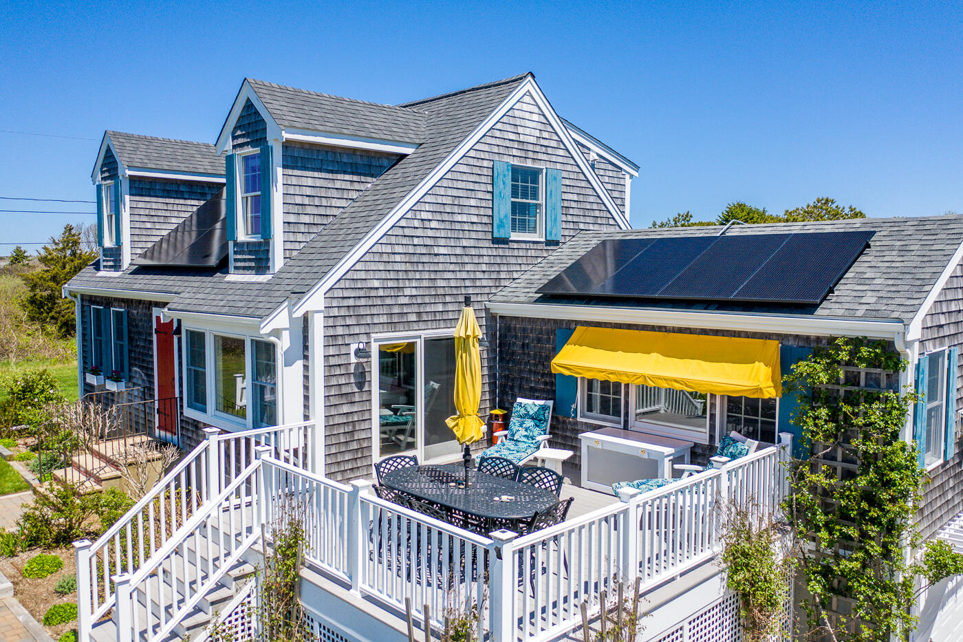 16 Bay View Road Truro, MA 02666 - Photo 54 of 57 a view of house with a swimming pool and deck