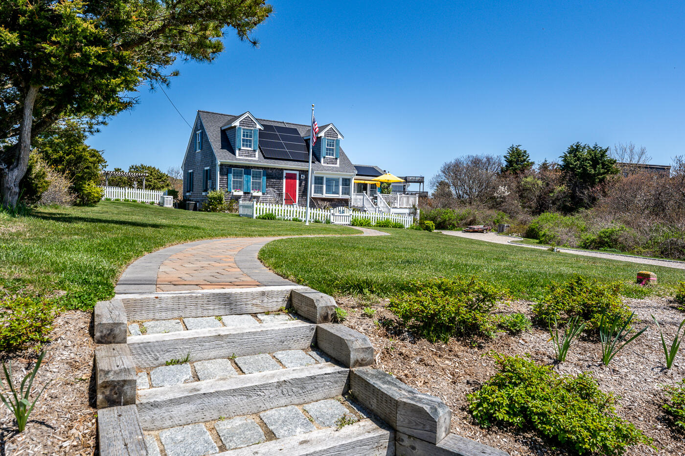 16 Bay View Road Truro, MA 02666 - Photo 57 of 57 a view of a house with a big yard plants and large trees