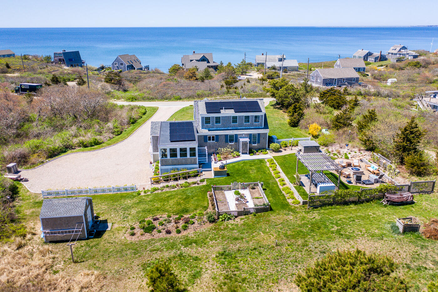 16 Bay View Road Truro, MA 02666 - Photo 7 of 57 a view of a house with a big yard