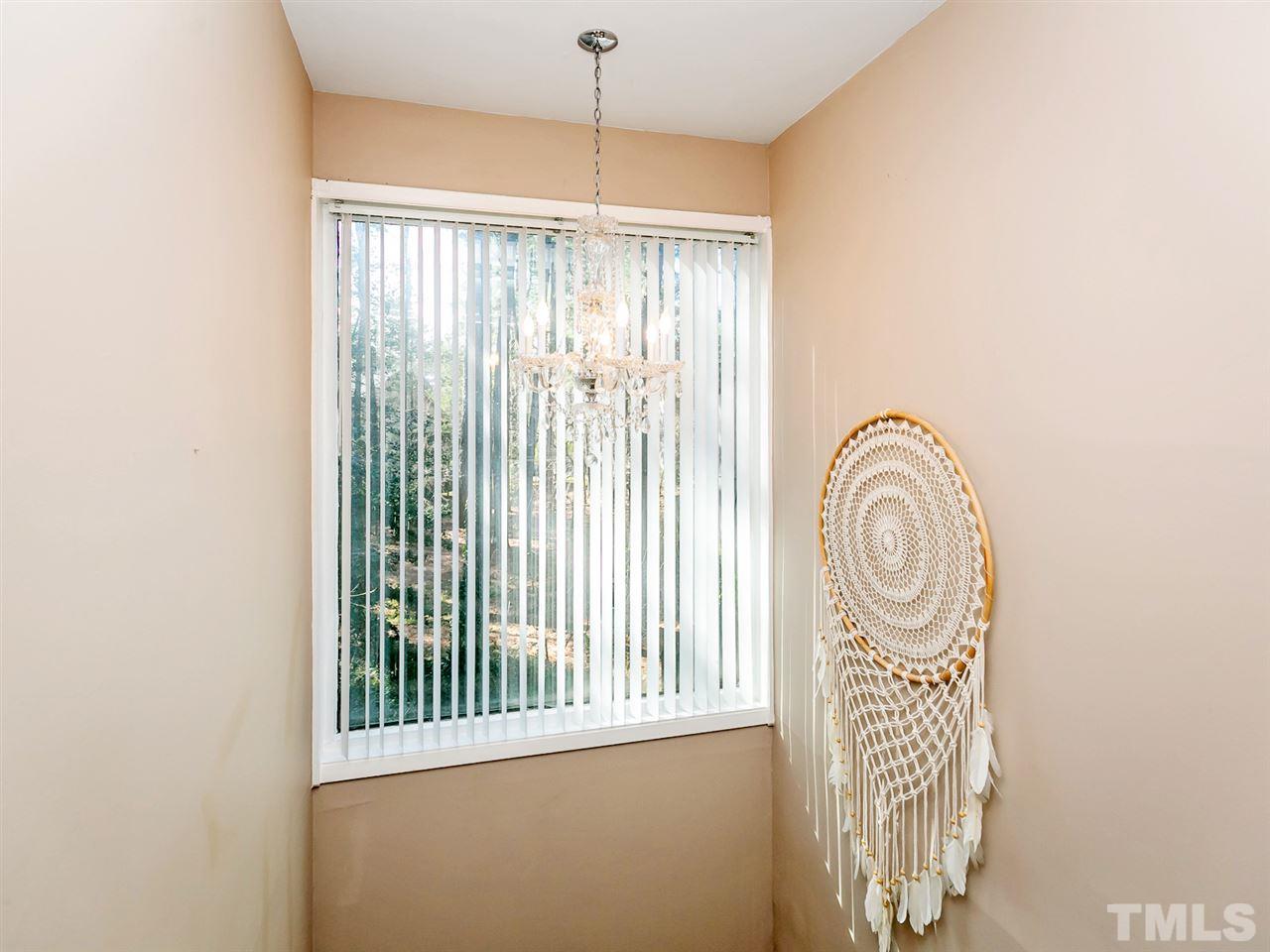 1722 Quail Ridge Road Raleigh, NC 27609 - Photo 22 of 28 a view of a door in the house