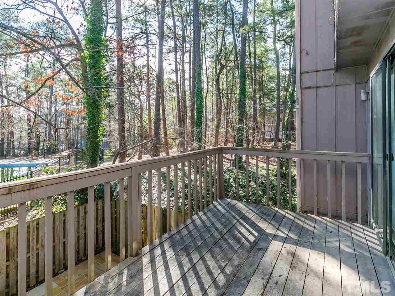 1722 Quail Ridge Road Raleigh, NC 27609 - Photo 25 of 28 a view of a wooden fence
