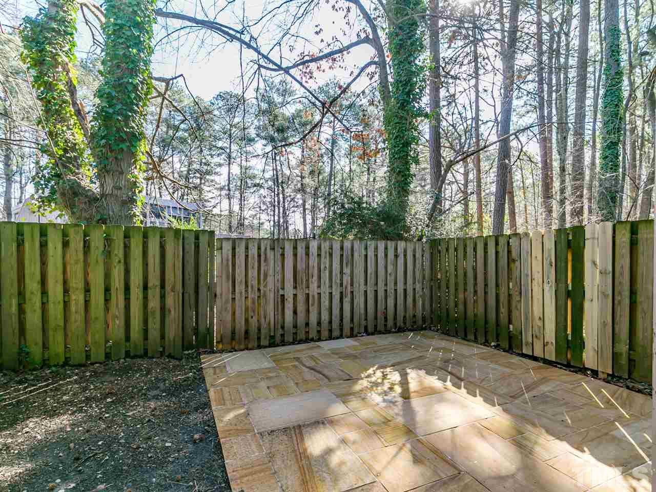 1722 Quail Ridge Road Raleigh, NC 27609 - Photo 26 of 28 a view of a backyard