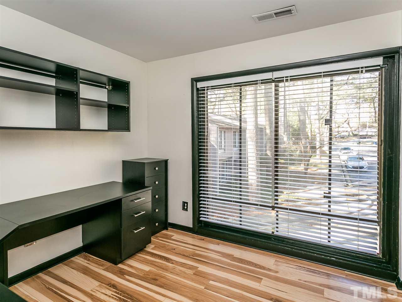 1722 Quail Ridge Road Raleigh, NC 27609 - Photo 10 of 28 a view of a window in a room