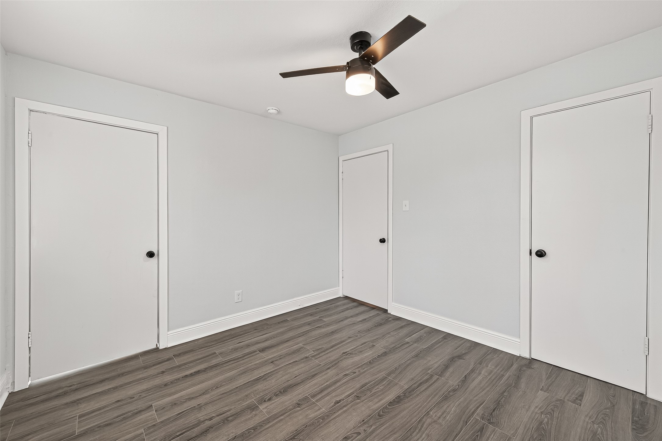 4729 Paradise Lane Houston, TX 77048 - Photo 13 of 43 a view of empty room with wooden floor