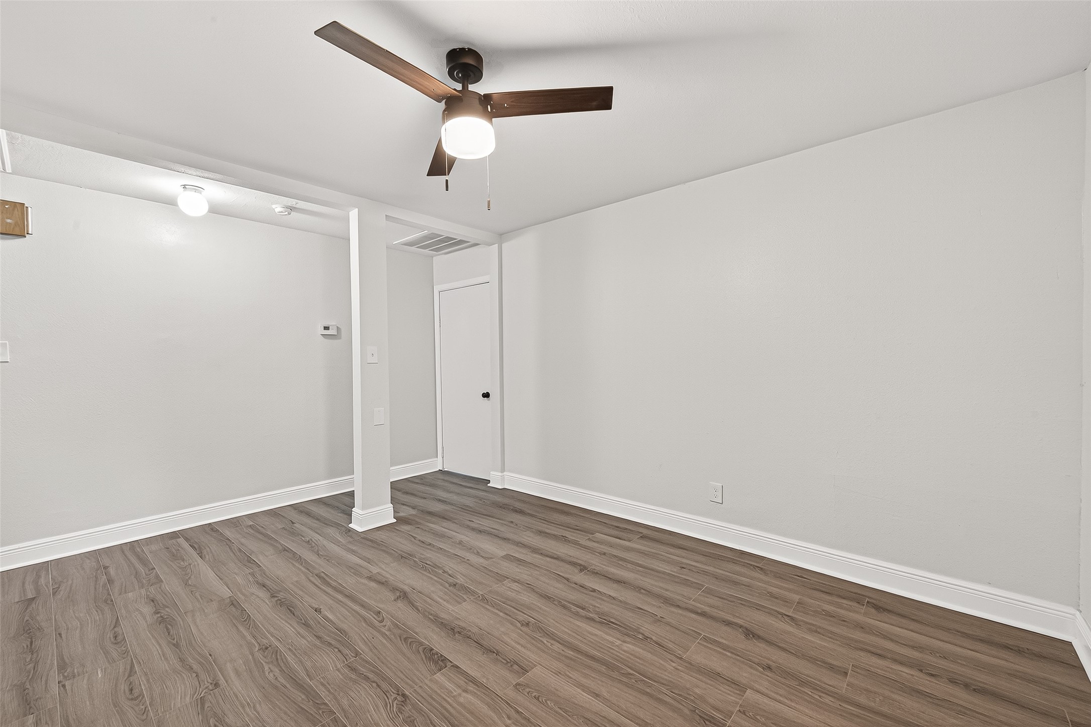 4729 Paradise Lane Houston, TX 77048 - Photo 16 of 43 wooden floor in an empty room