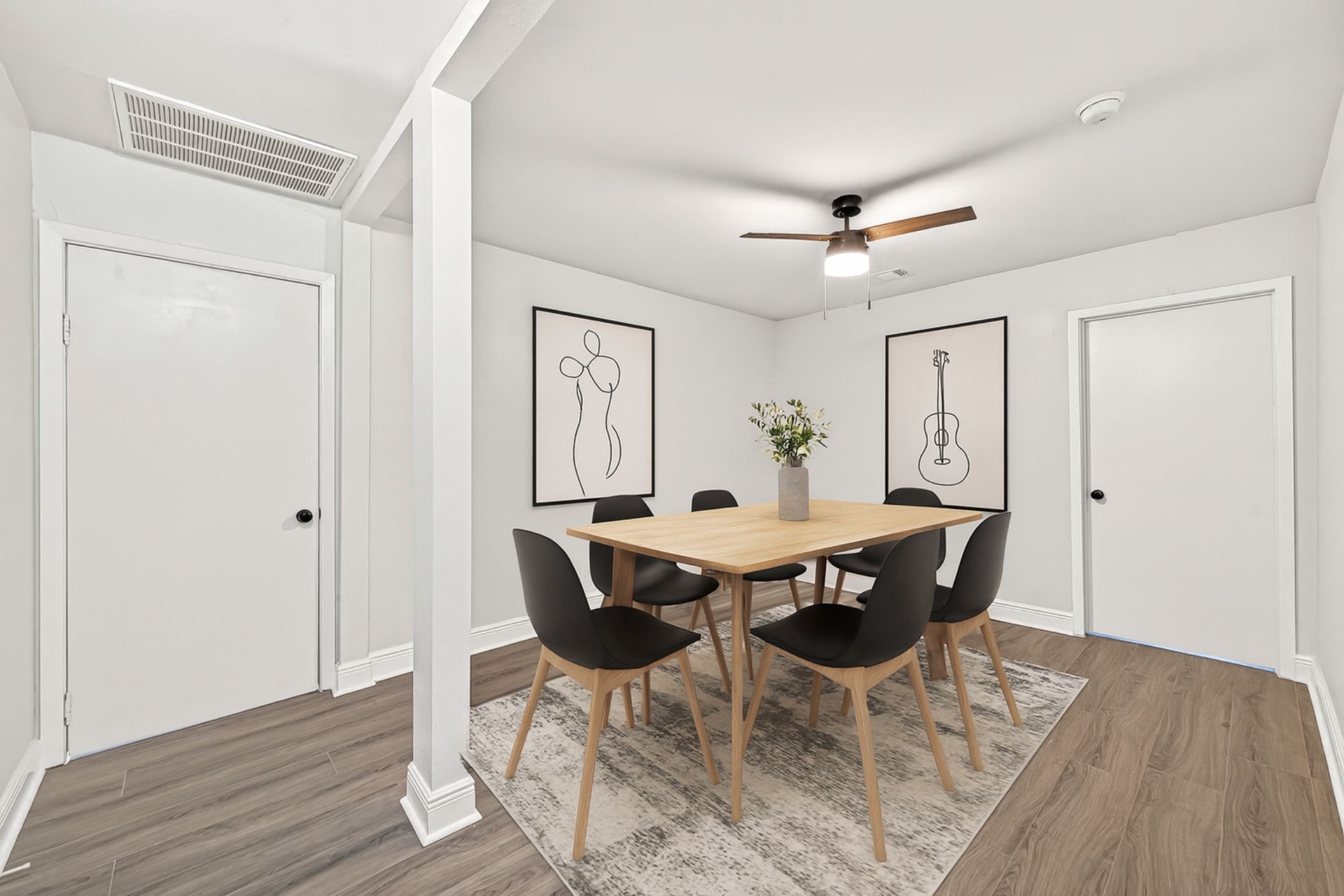 4729 Paradise Lane Houston, TX 77048 - Photo 18 of 43 a view of a dining room with furniture and wooden floor