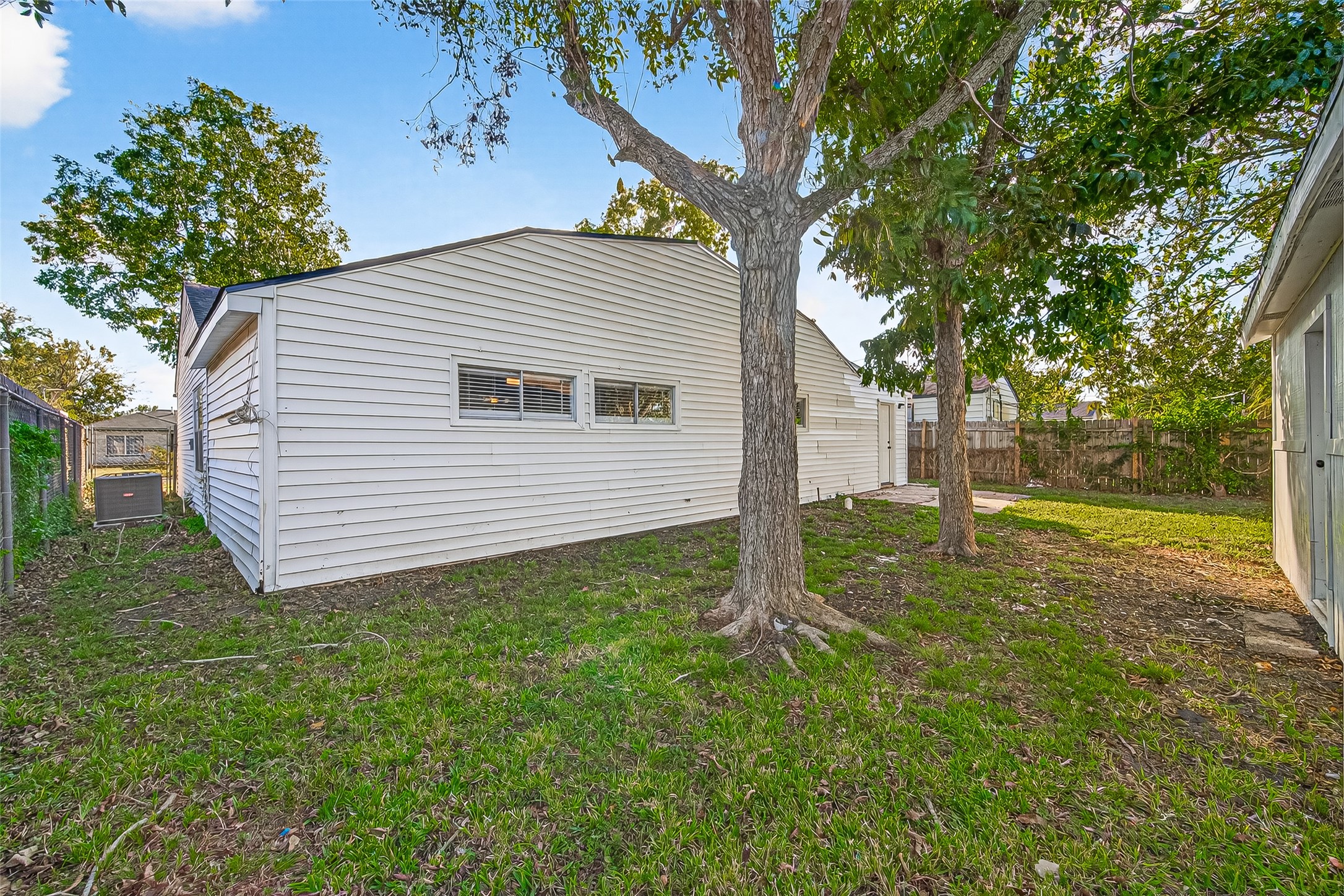 4729 Paradise Lane Houston, TX 77048 - Photo 39 of 43 a view of a backyard with large trees